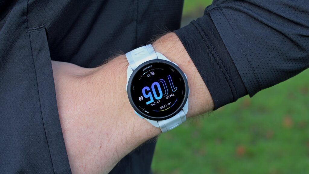 Garmin Forerunner 165 on wrist from front-on angle