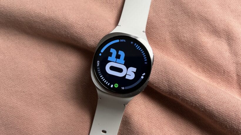 samsung galaxy watch 8 watch face with a pink background